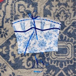 Dainty tube top. So flattering!